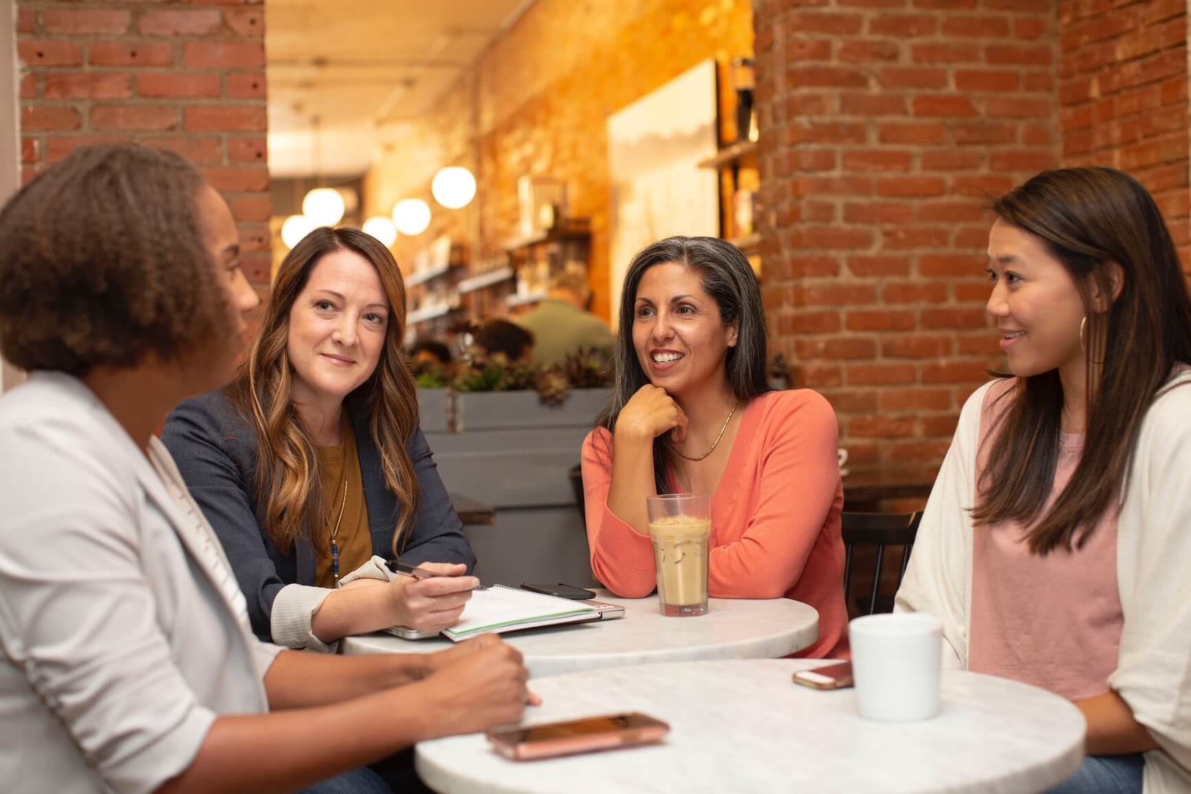 coworkers chat in office