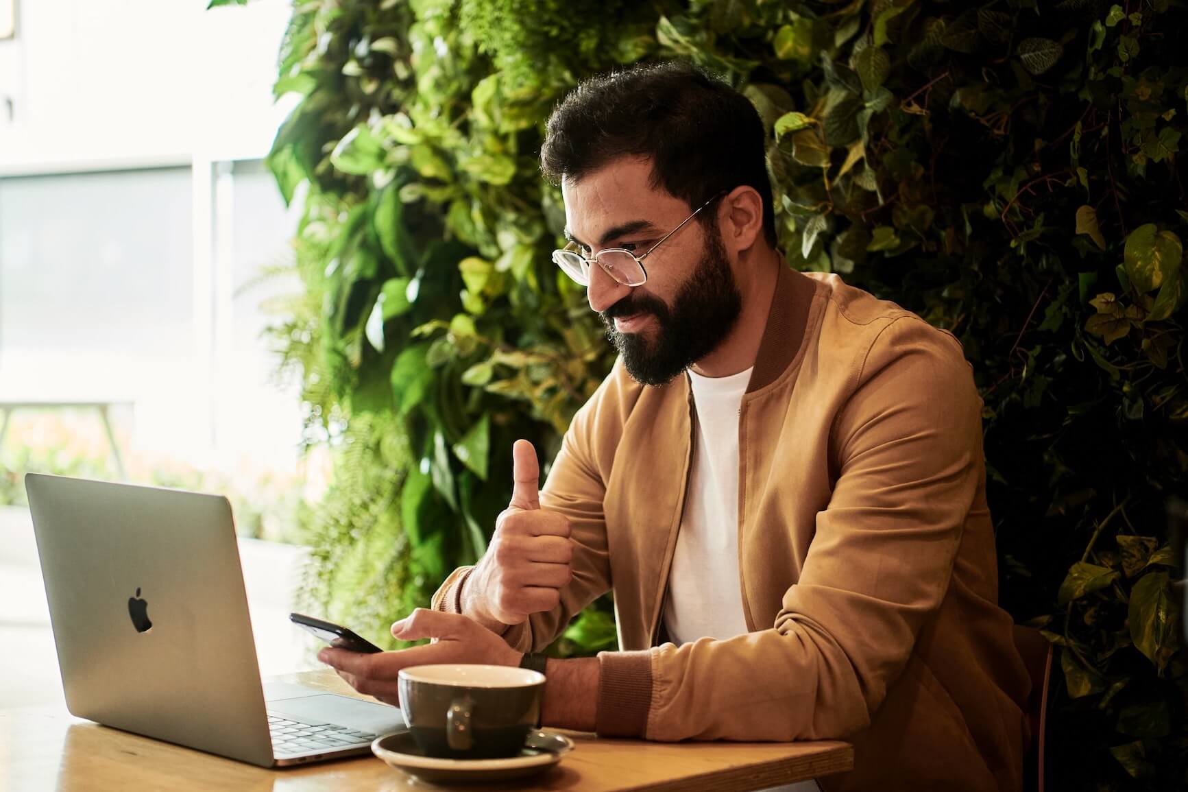 man working in cafe