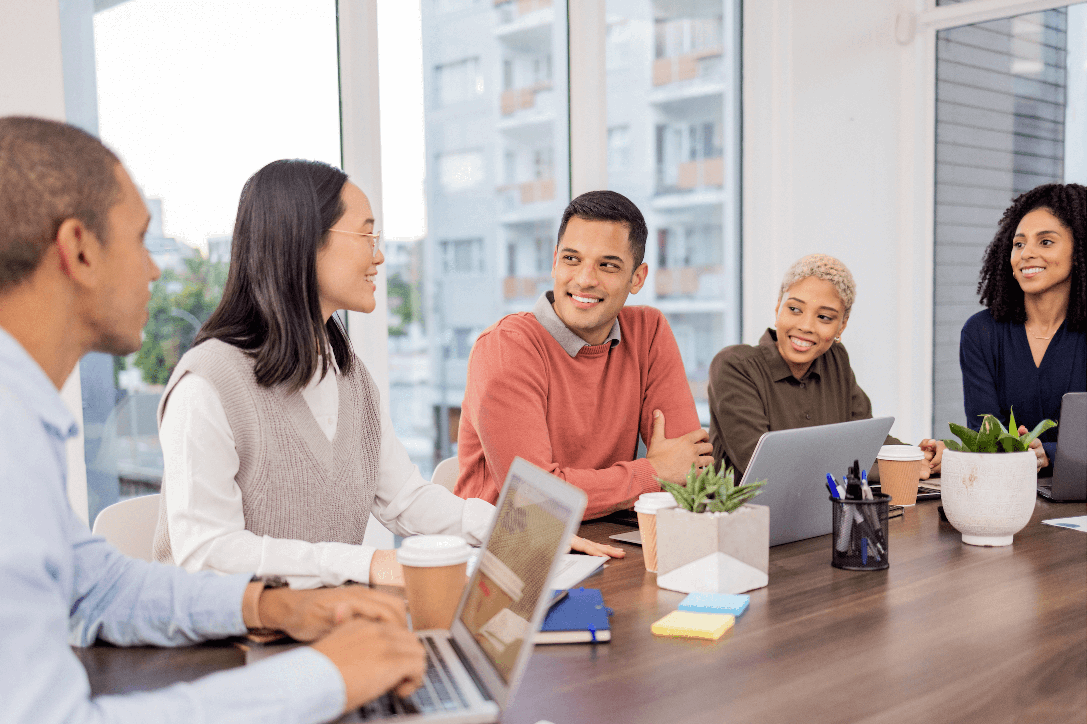 business team meets in conference room