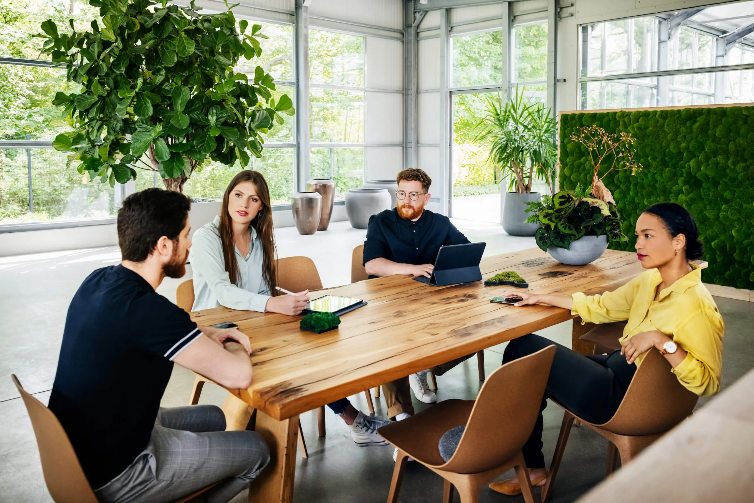 business team in green conference room