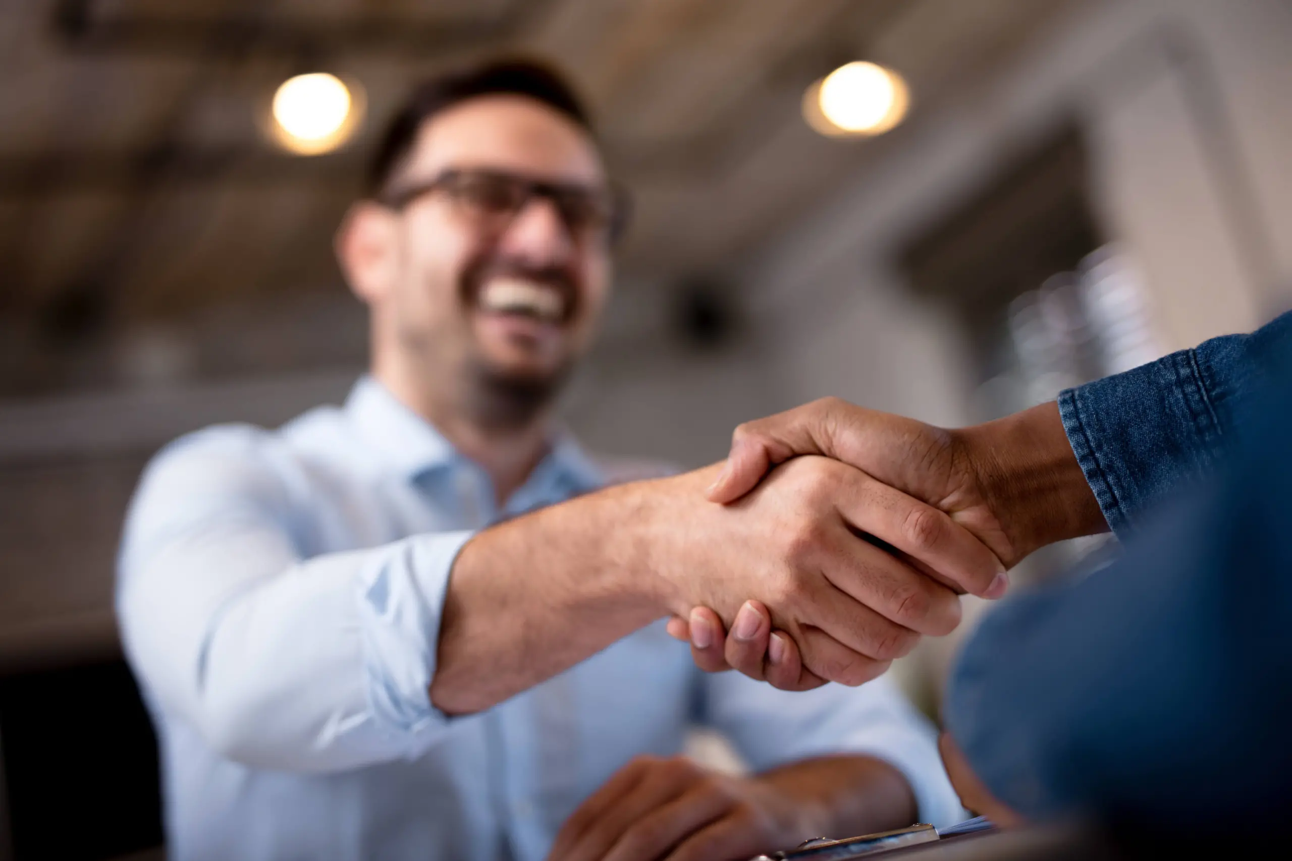 job seeker interviewer shake hands