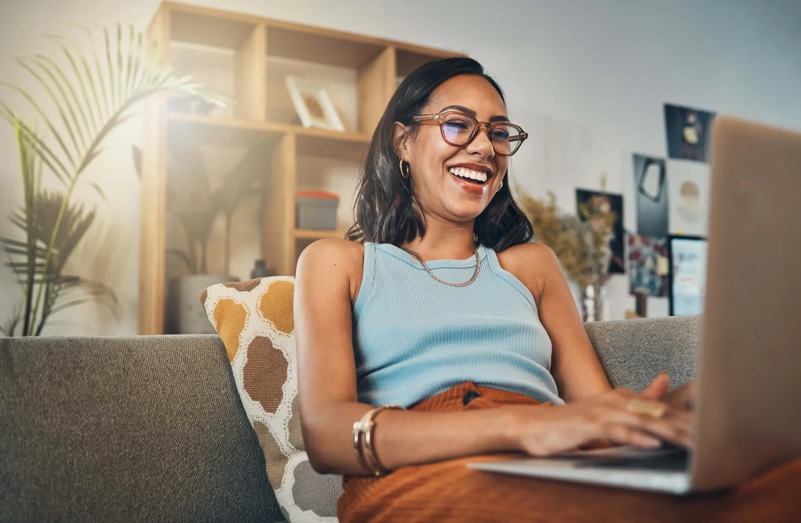 smiling business professional sitting on couch