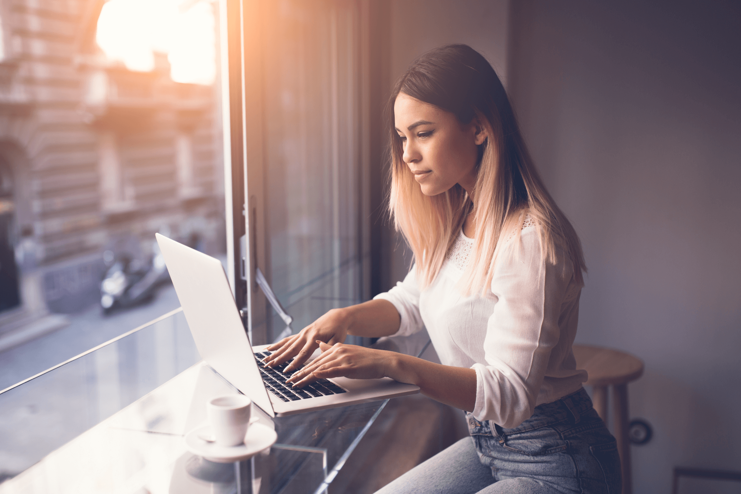 young professional office window laptop