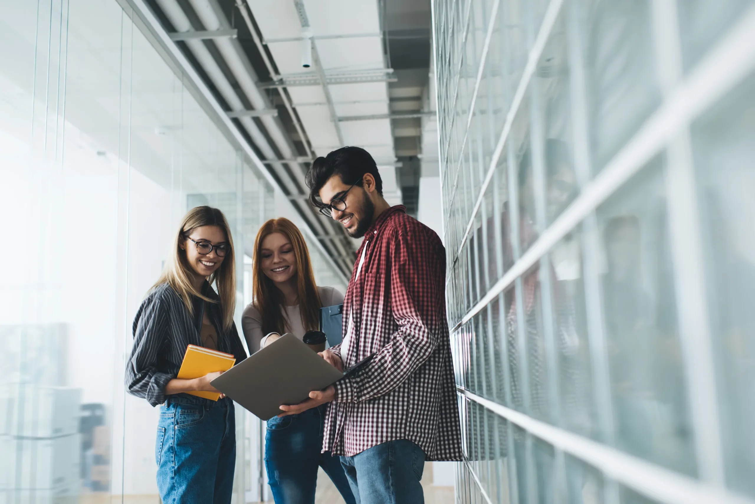 Group of Happy Colleagues Looking at a Computer