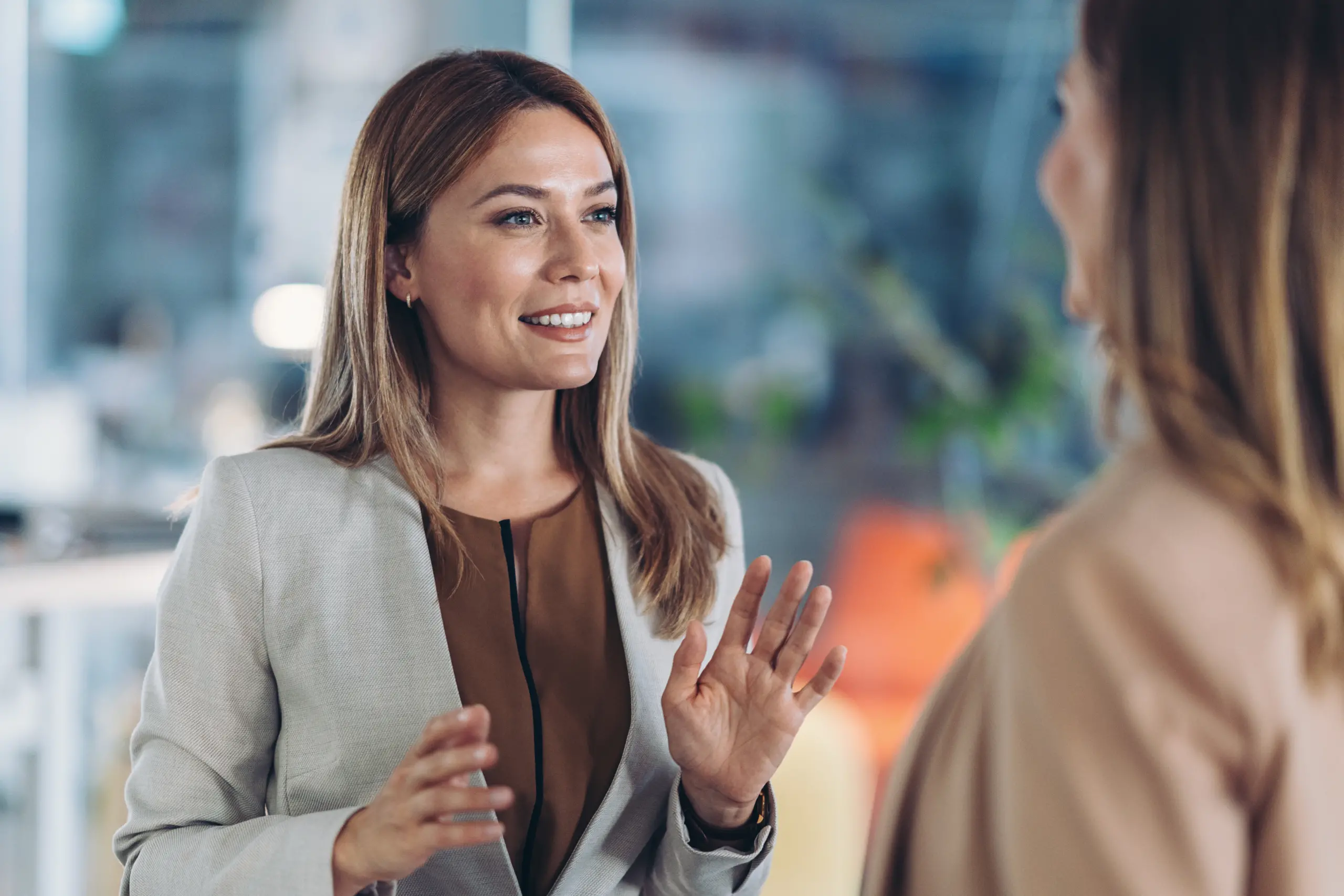 women-talking-at-company